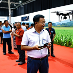**Image Prompt:** A bustling agricultural technology conference in Malaysia. Focus on a farmer enthusiastically talking to a drone vendor, with various drones displayed in the background. Show the excitement and potential of drone technology in modern Malaysian farming.